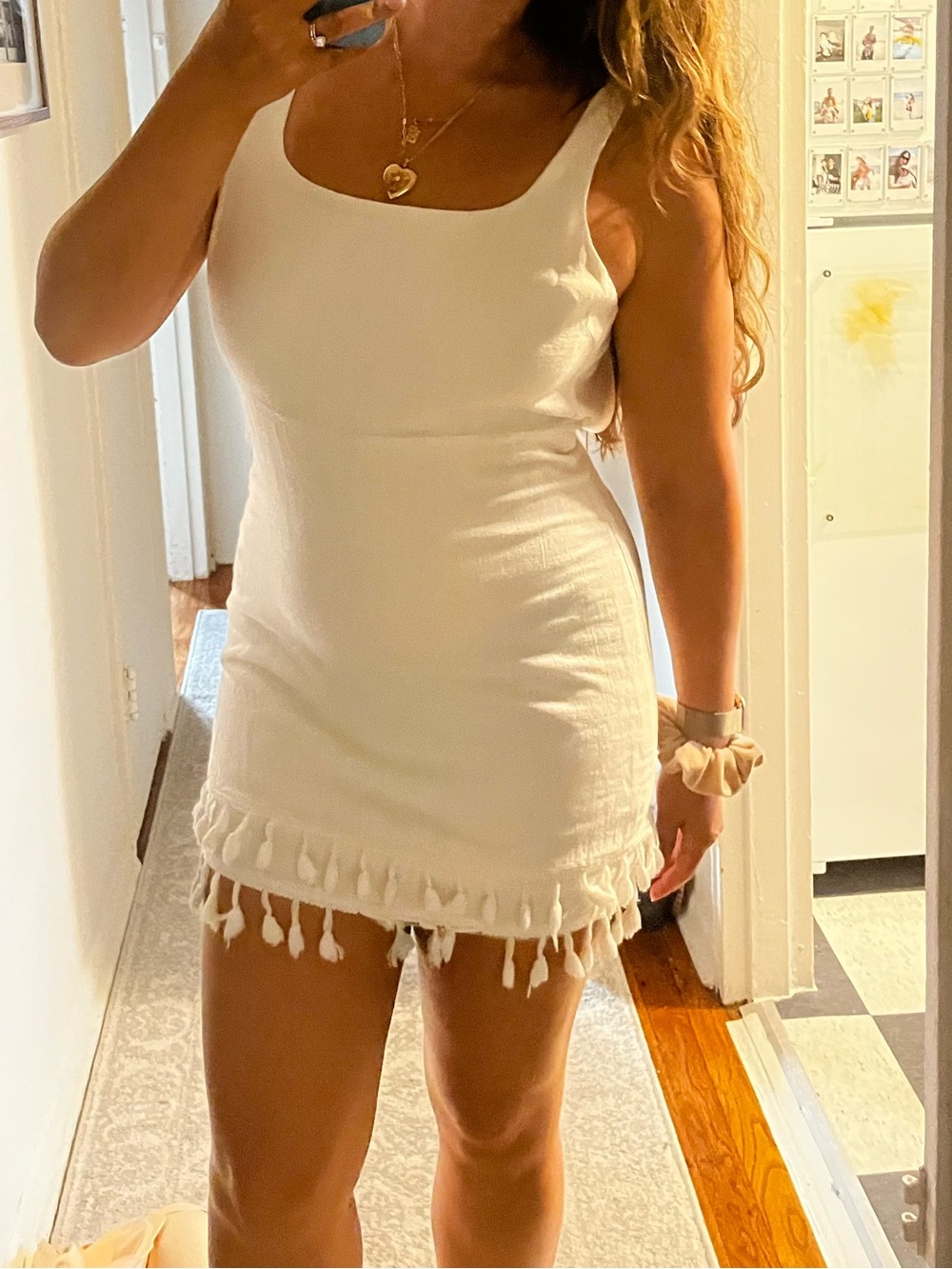 Lulu's White Sleeveless Tassel-Hem Mini Dress